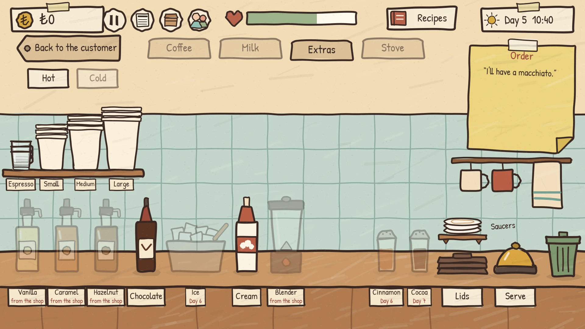 The extras shelf: syrups, chocolate, ice, cream, a blender and cinnamon